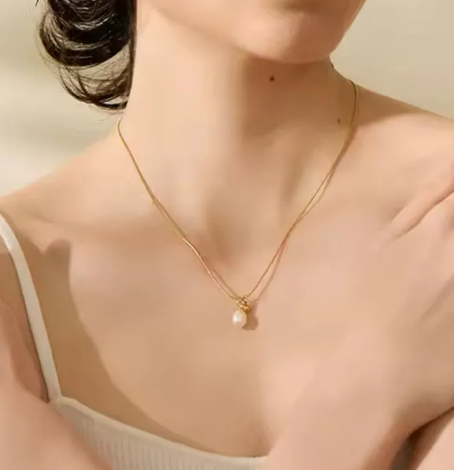 Dainty Fresh Water Pearl Pendant in Rat Tail Necklace | Erika Williner Designs