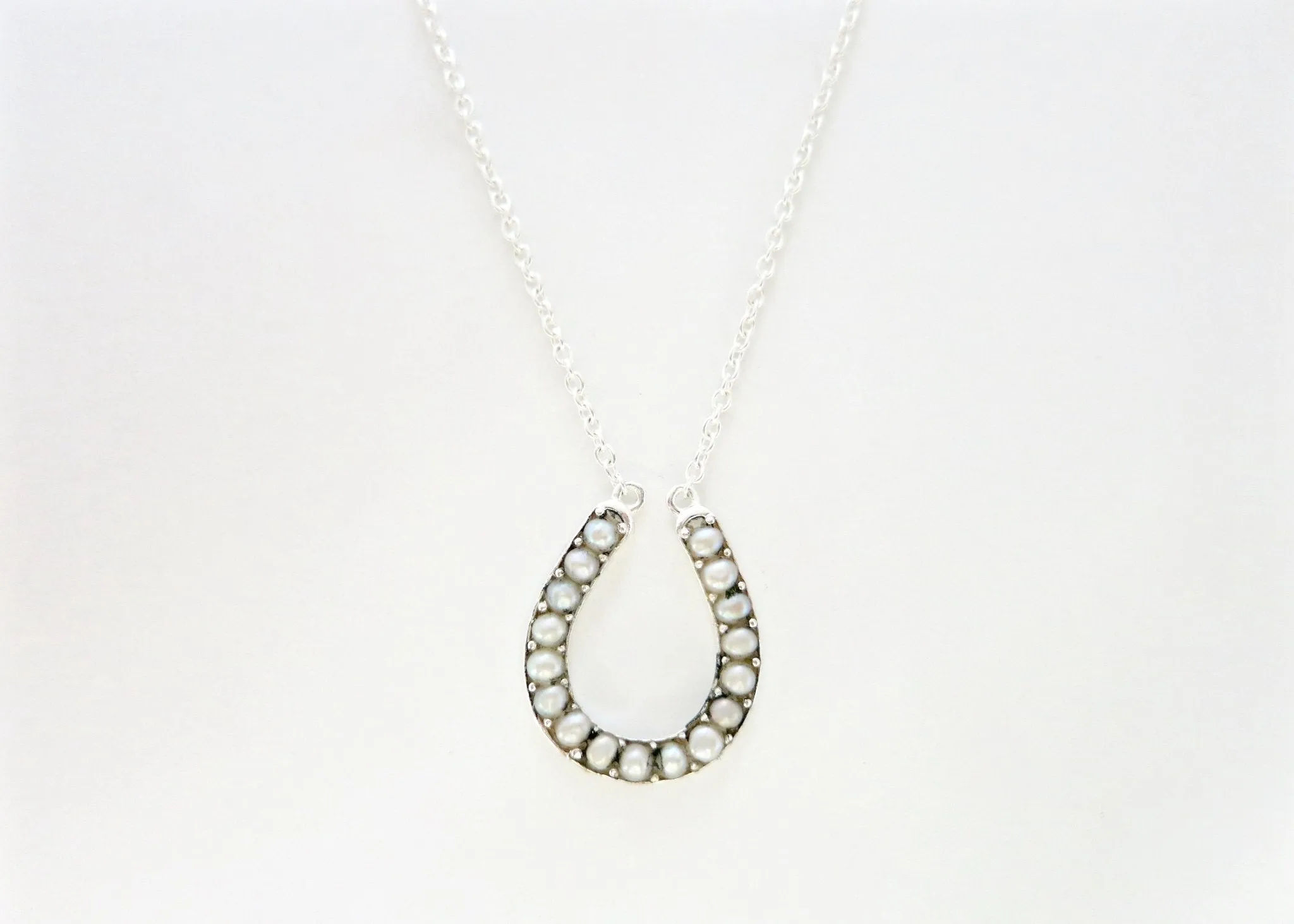 Dainty, pearl encrusted horse-shoe pendant necklace
