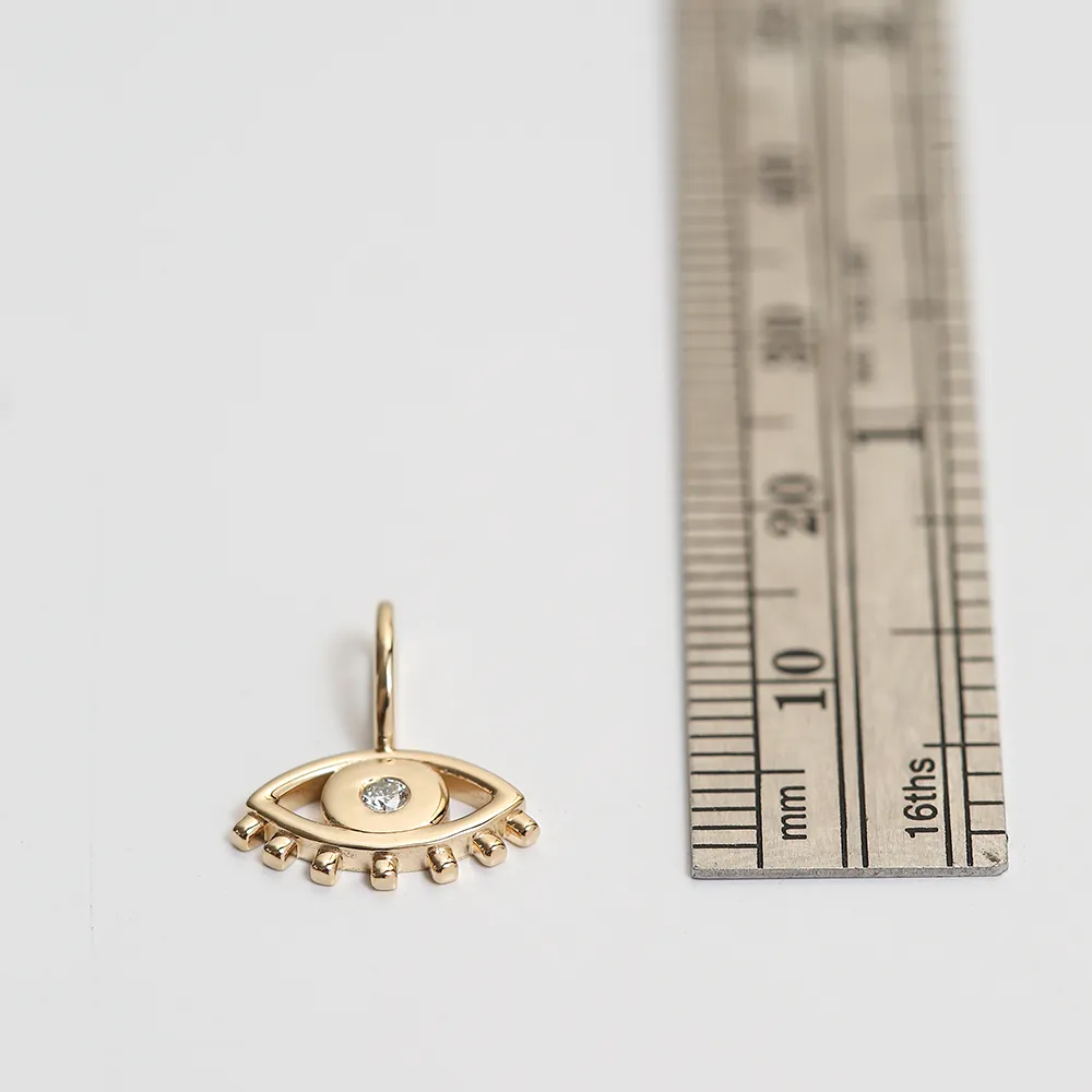 EVIL EYE CHARM | 14K YELLOW GOLD & WHITE DIAMOND