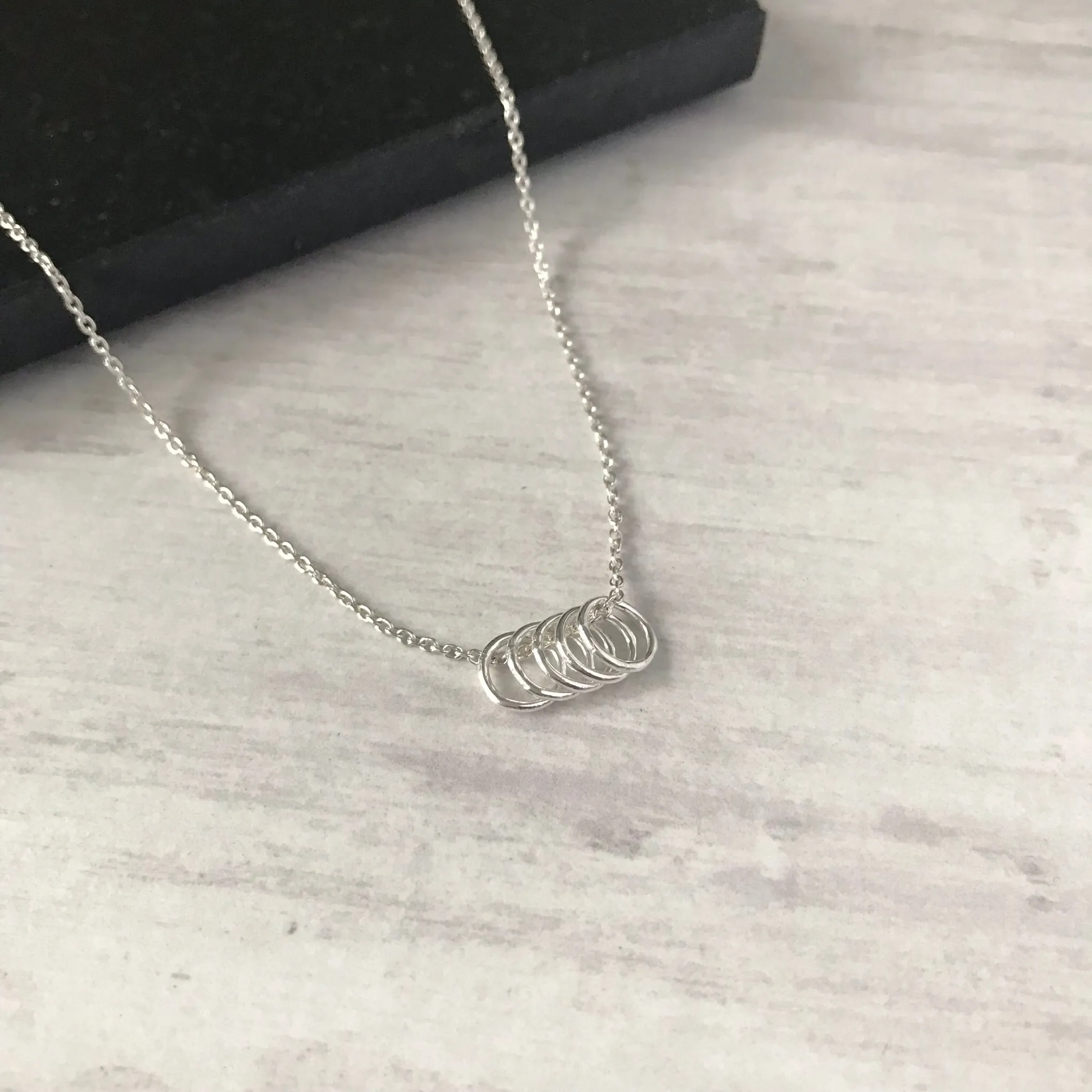 Five Silver Rings Necklace