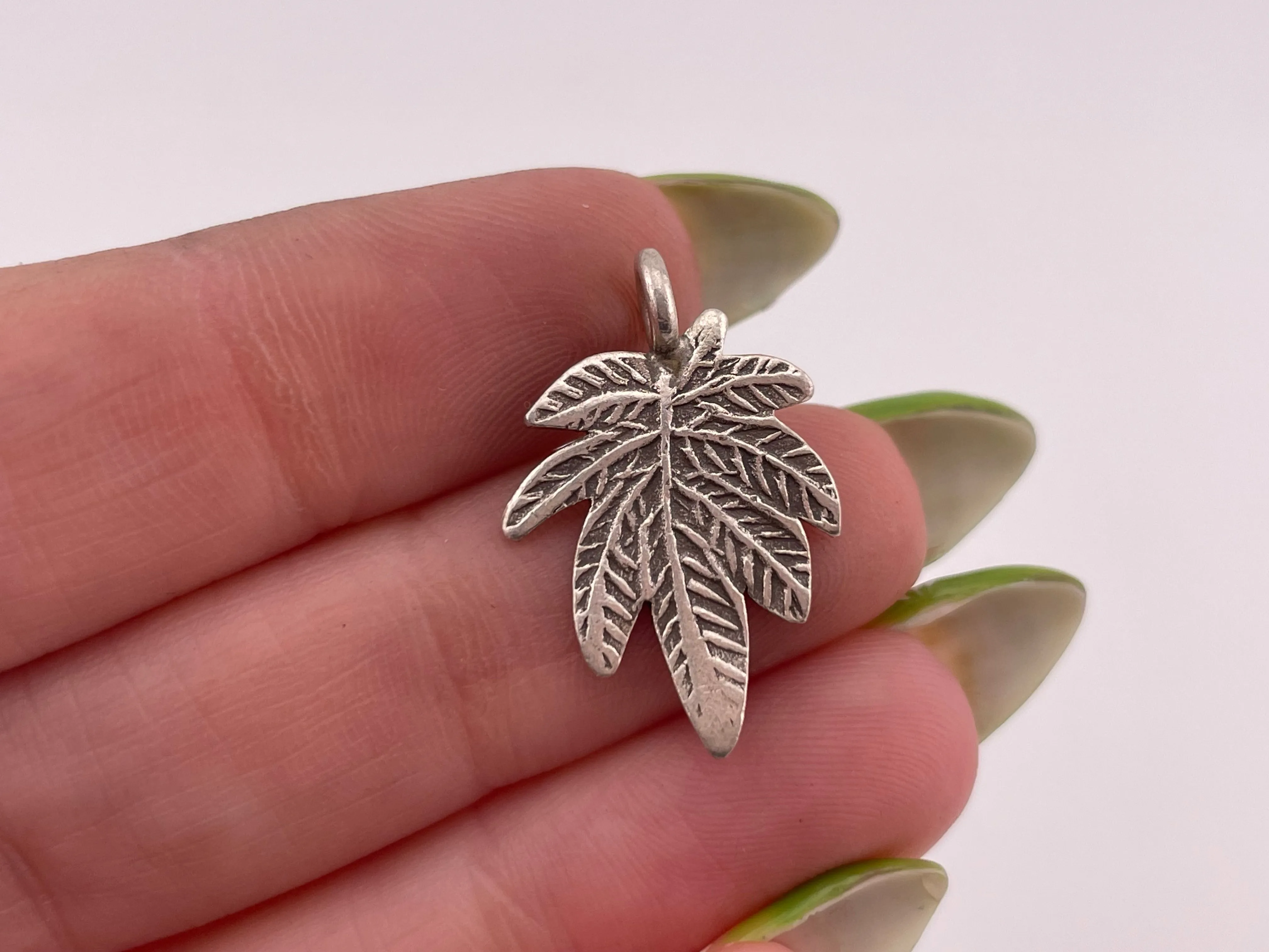 sterling silver marijuana pot leaf pendant